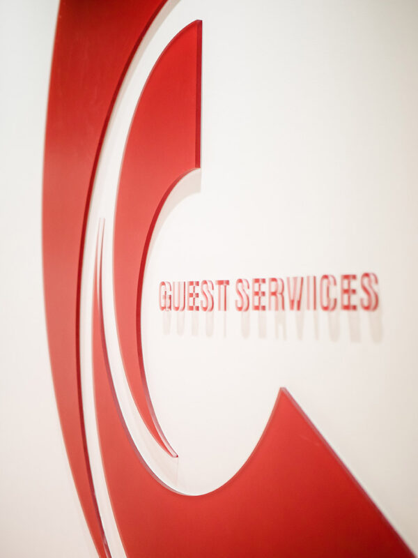 guest services red logo