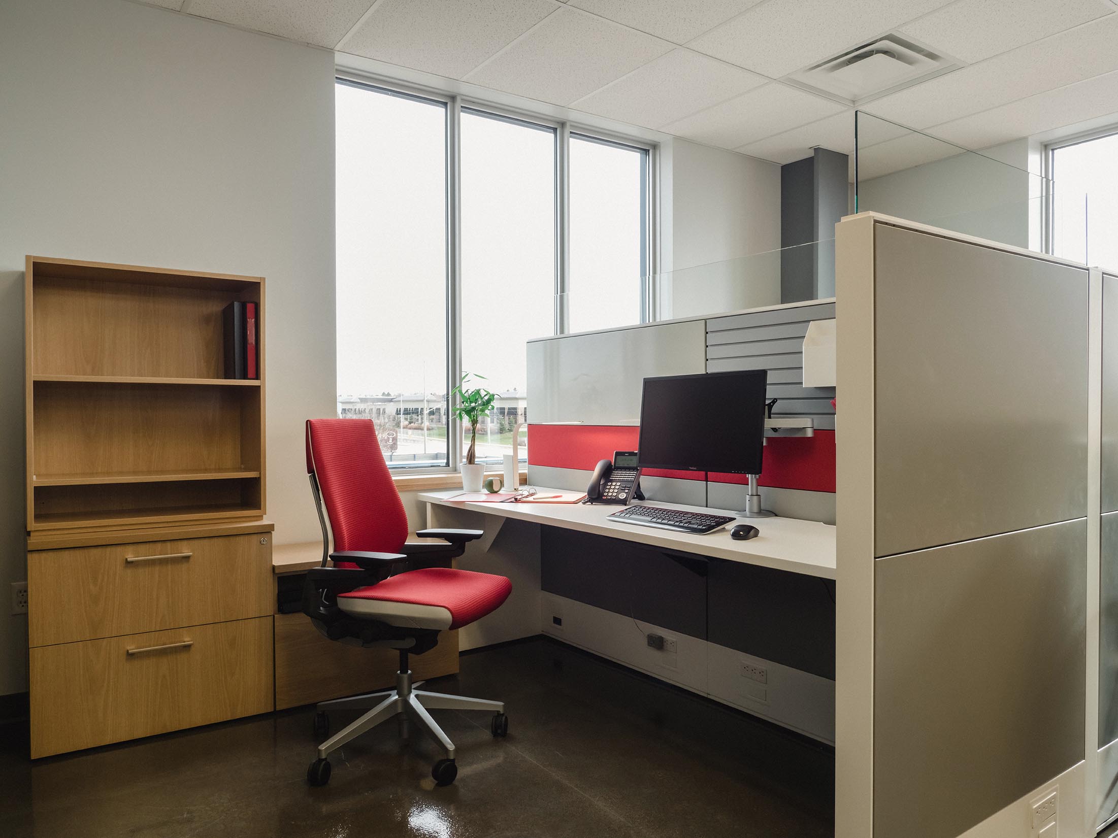 cubicle private work station with red accents