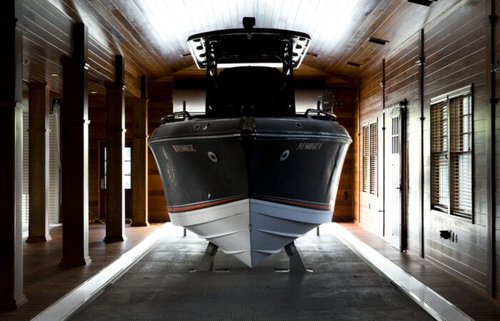 Custom boathouse exterior with boat slips and living quarters – 1000 Islands
