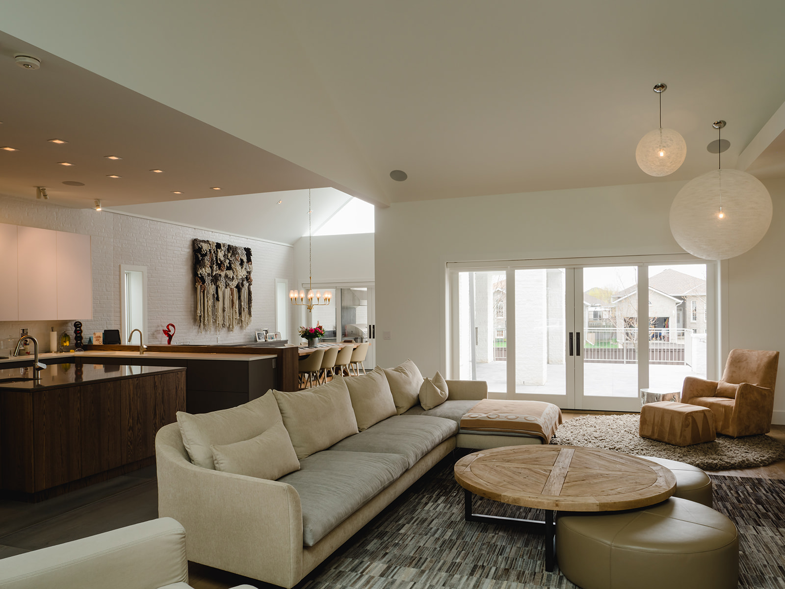 Contemporary kitchen and dining space with connection to outdoor terrace