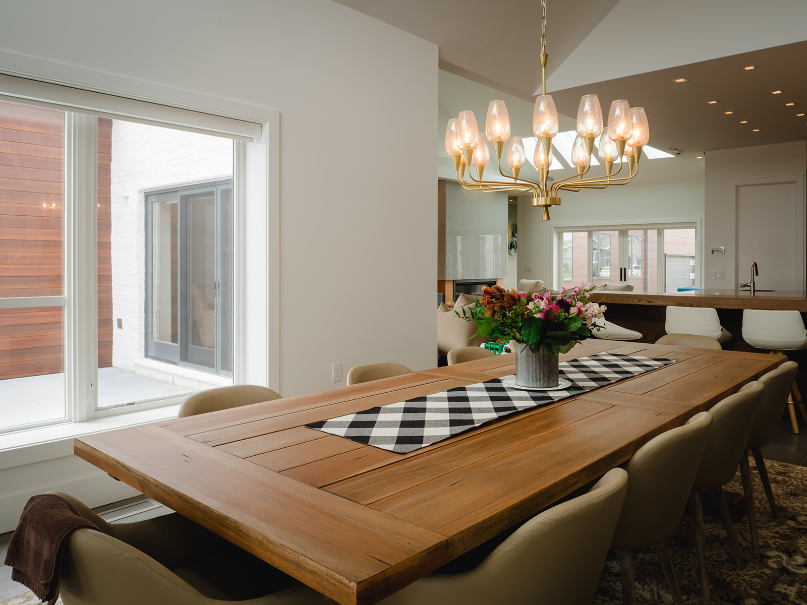 Dining room oak table with brass chandelier