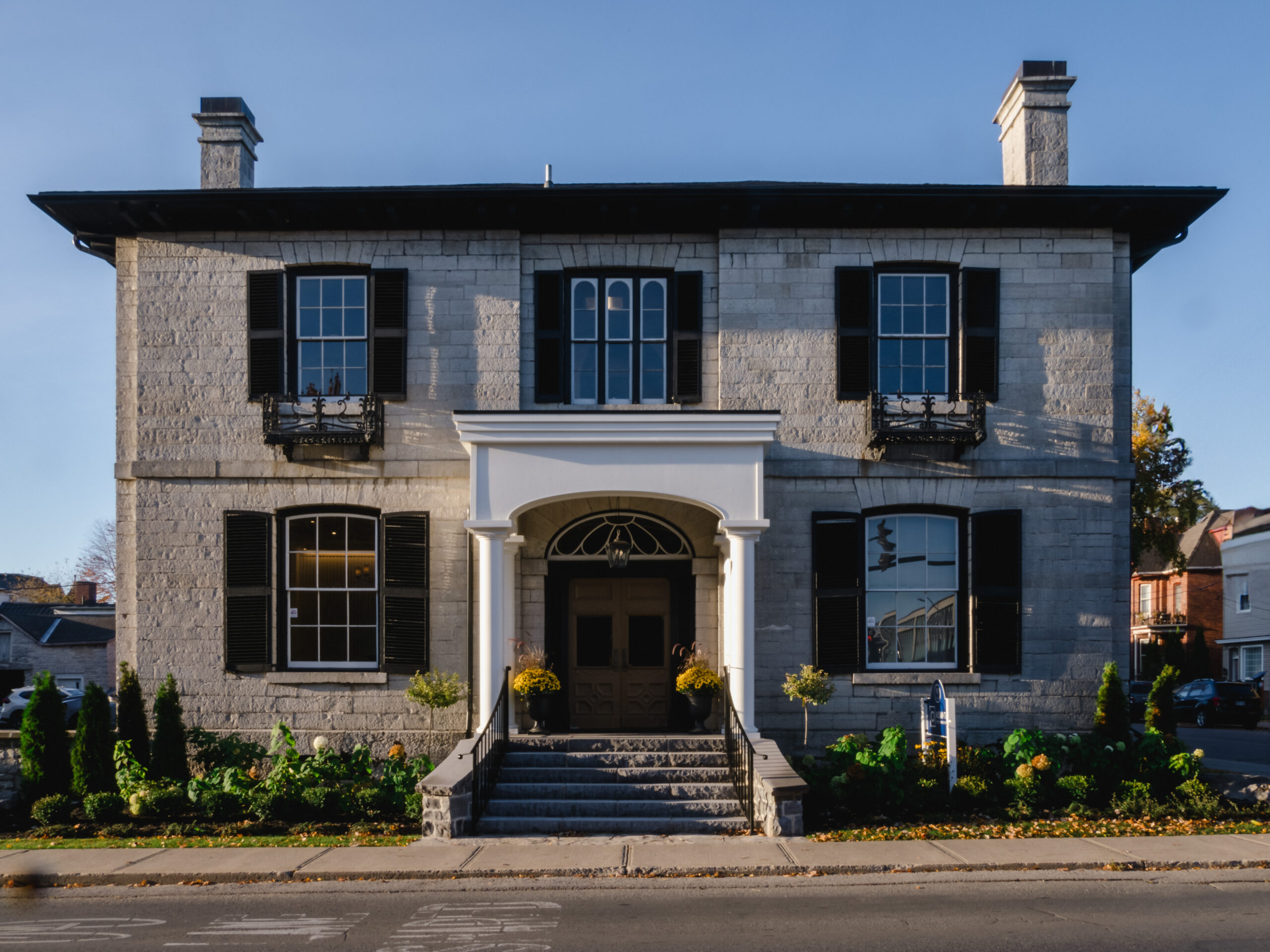 Renovated heritage office with new classical entry portico – Kingston ON