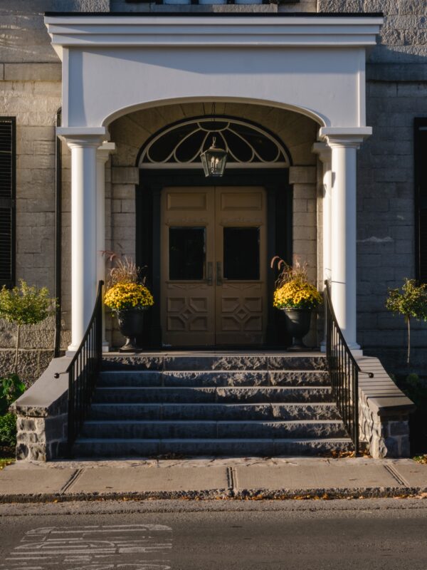 Classic front entrance to restored Coverdale-designed property