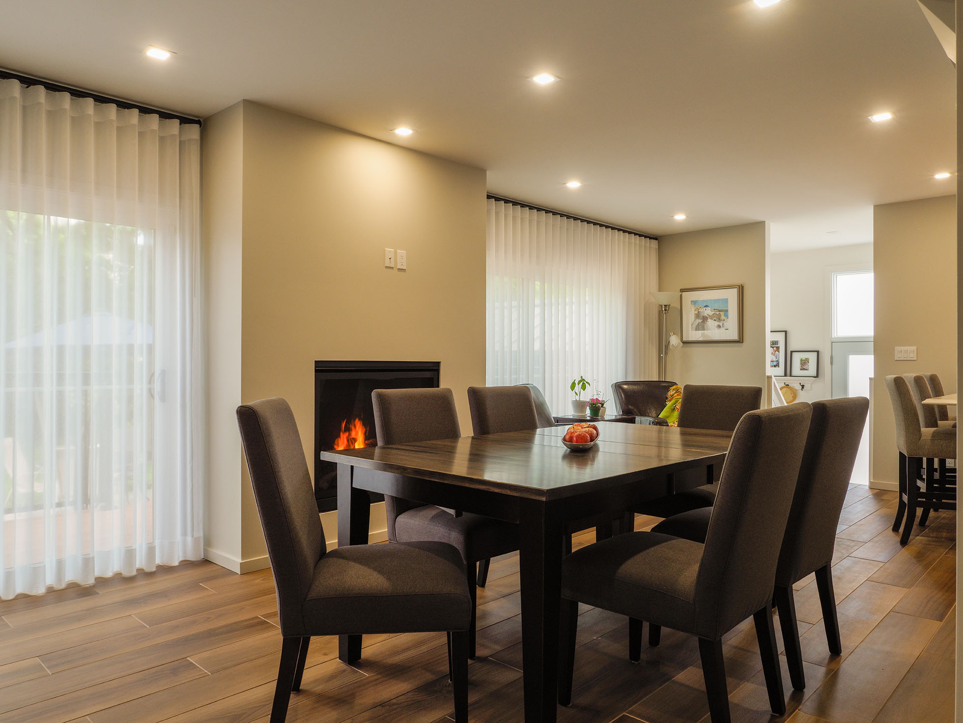 view of dining area with white ripplefold curtains